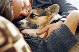 Man holding dog